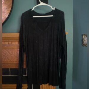 Black long sleeve top.